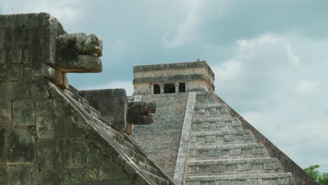 4k cinematic landscape footage of the mayan ruins monument of chichén itzá, one of the seven wonders, in yucatan, mexico on a sunny day