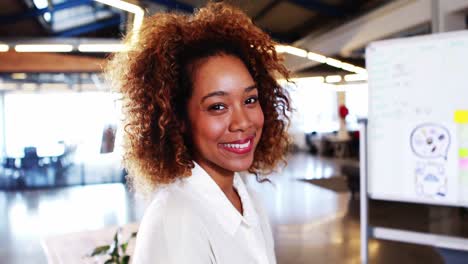 Businesswoman-smiling-in-office