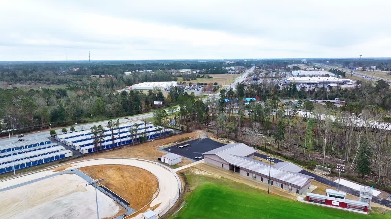 Flying Over Sports Field Towards The Highway In Valdosta, Georgia, USA. - aerial shot