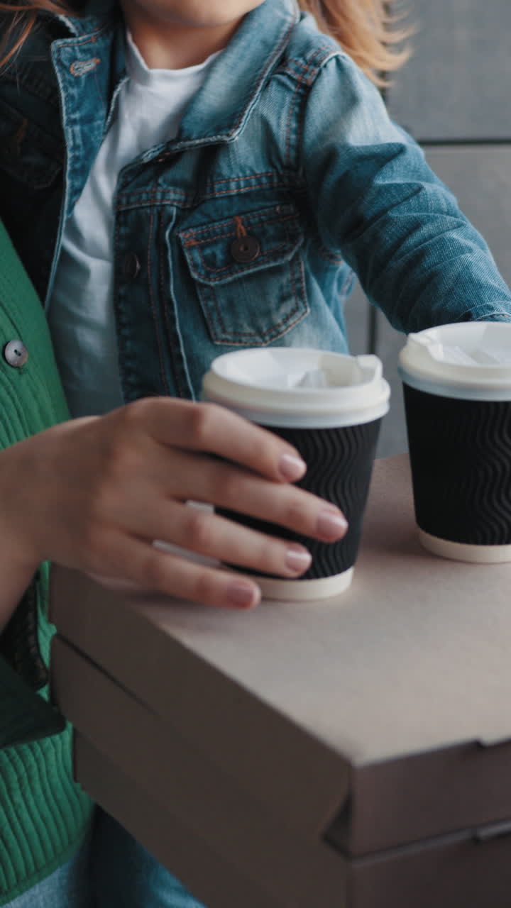 Mother and daughter enjoying coffee together