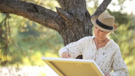 a peaceful and serene scene of a skilled artist capturing the stunning beauty of nature on the - a peaceful and serene scene of a skilled artist capturing the stunning beauty of nature on the canvas