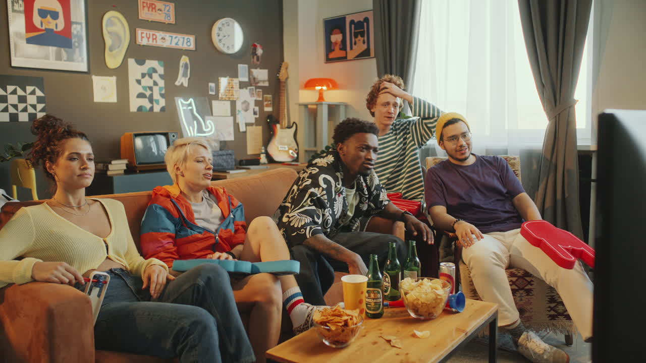 Friends Getting Disappointed as Watching Sports Game on TV at Home