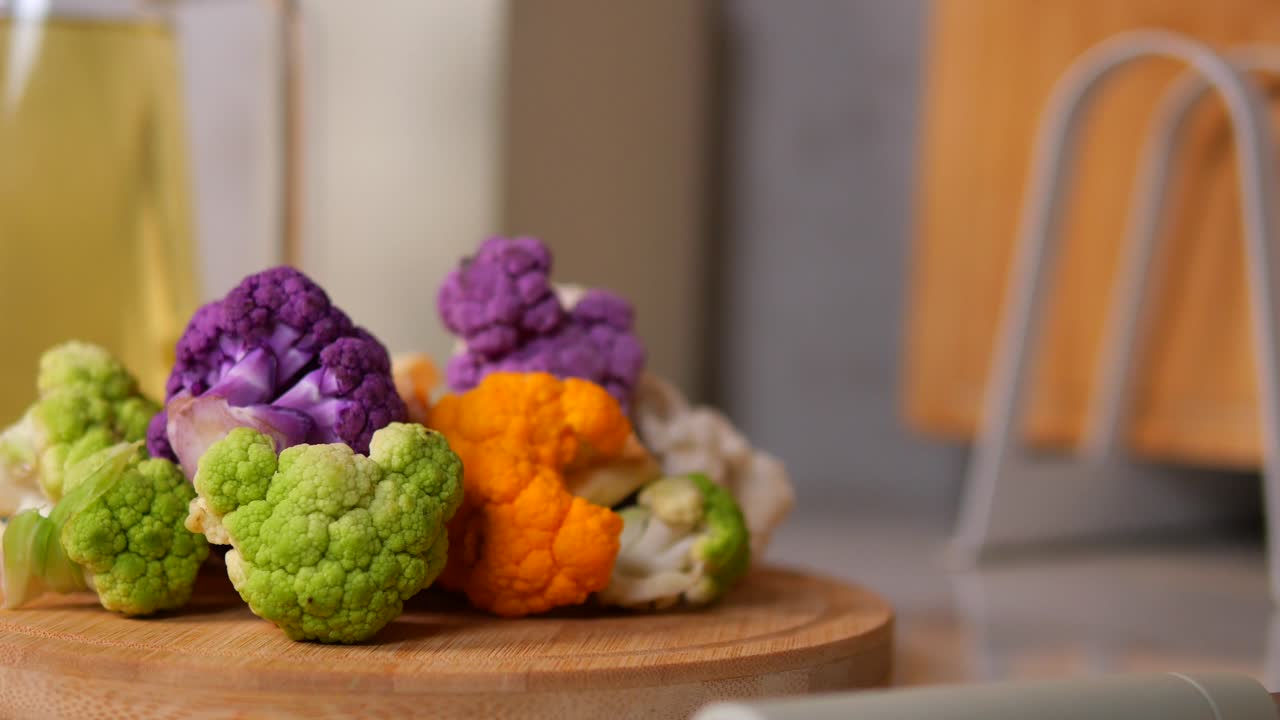 Colorful Cauliflower on a Cutting Board