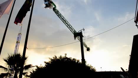 giant see-saw , high up, silhouette