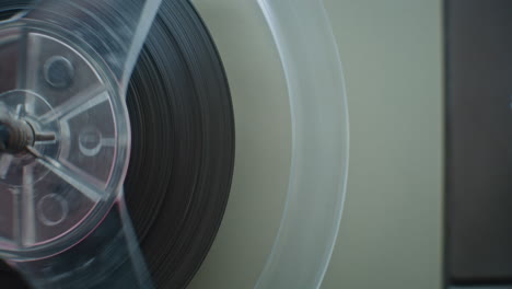 reel-to-reel tape recorder in action