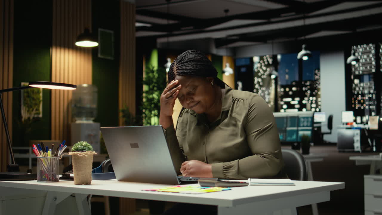 African american woman after hours feeling unstable and overwhelmed