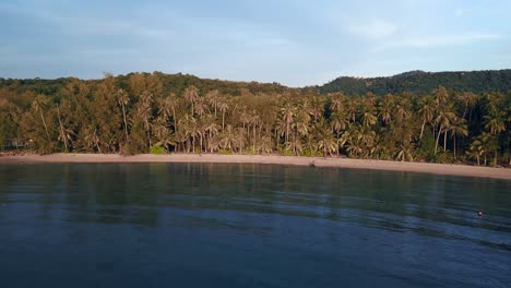 Empty-beachGreat-aerial-top-view-flight-natural-beach-bay-thailand,-wood-pier-golden-hour,-lagoon-koh-kood-2022