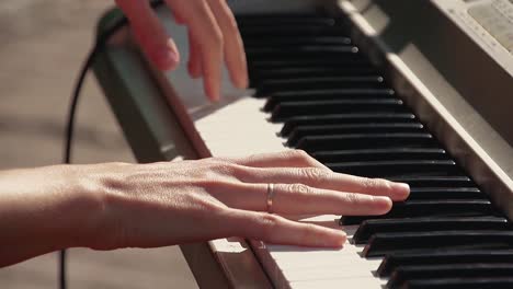 young keyboard girl plays a synthesizer 1