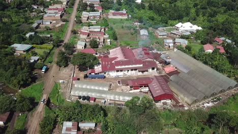 Popular-tourist-attraction-in-Uganda---Kisinga-Coffee-Station,-aerial-view-of-manufacture