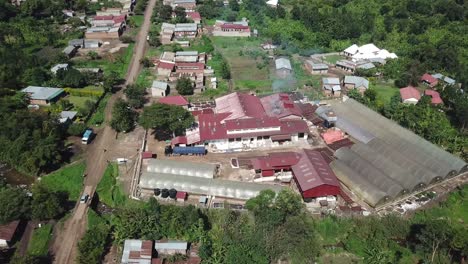 popular tourist attraction in uganda - kisinga coffee station, aerial view of manufacture