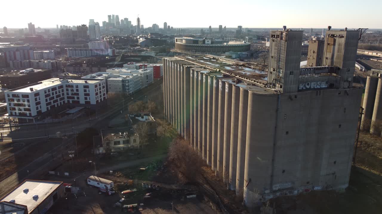Drone approaching abandoned grain elevator in Minneapolis, MN at Golden Hour