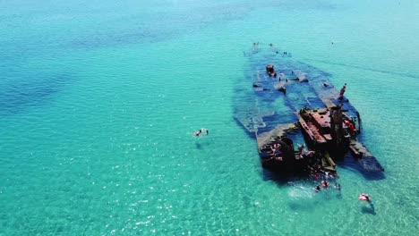 several tourists on the ancient shipwreck near thessaloniki in greece