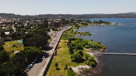 aerial shot of lake and city of villarica