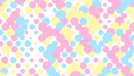 pastel polka dots floating on a white background.