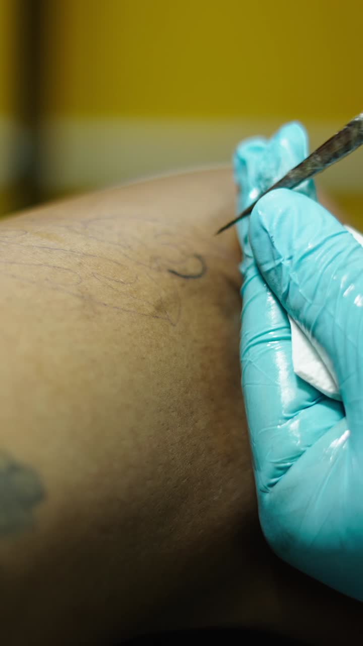 Tattoo being applied to skin