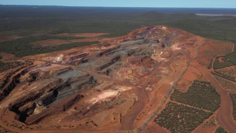 overhead shot of a mining site with red soil in western australia, aerial orbital