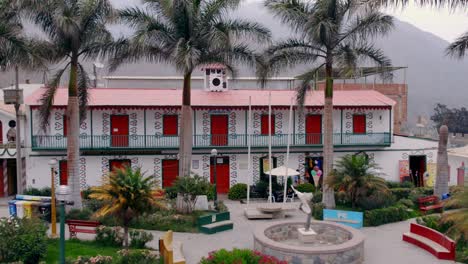 orbit shot of central park in colorful town of antioquia, peru