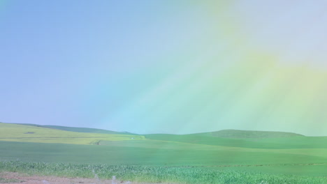 video of rainbow fog over moving countryside landscape