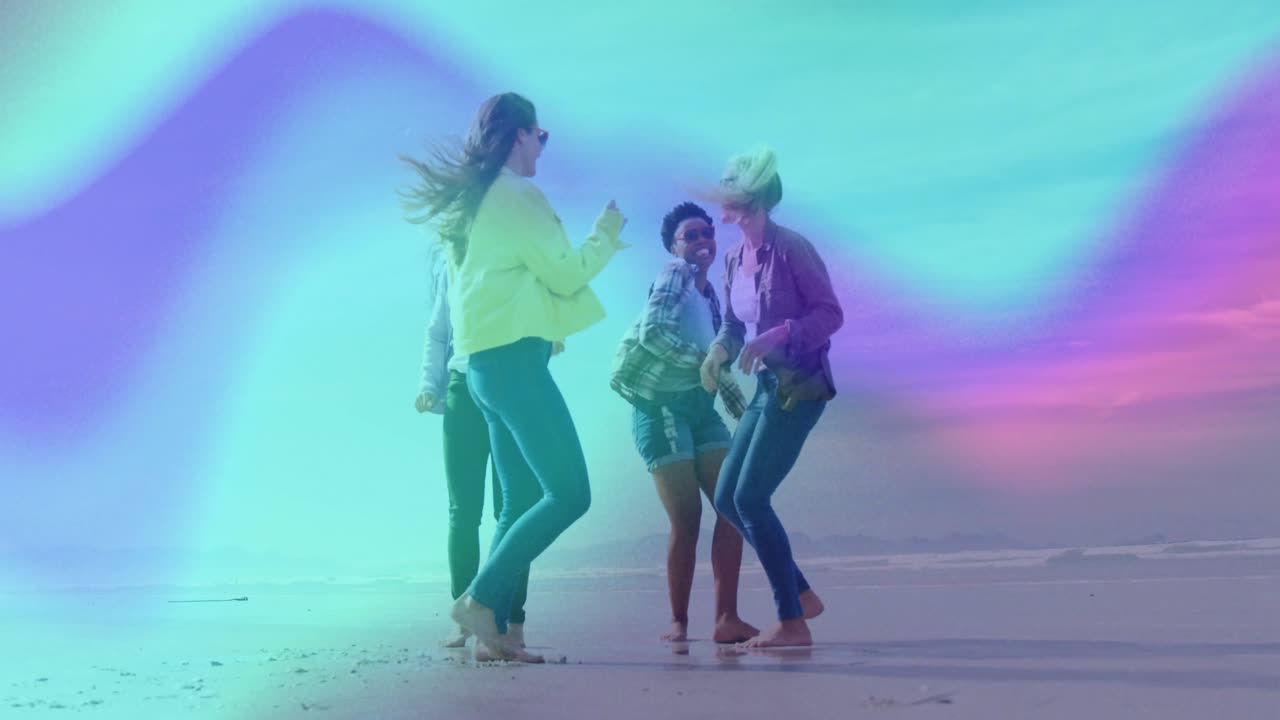 Entertainment using neon wave overlay initiating four friends dancing for fun on beach at sunset
