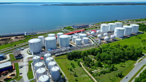 Aerial-of-crude-oil-reserve-storage-tanker-facility,-Baltic-Coast,-Estonia