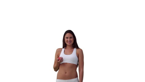 mujer jugando lanzando y atrapando una pelota