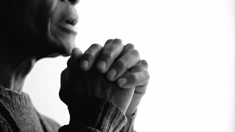 praying to god with hands together on grey background stock video stock footage