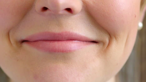 closeup of a woman smiling and laughing with joy