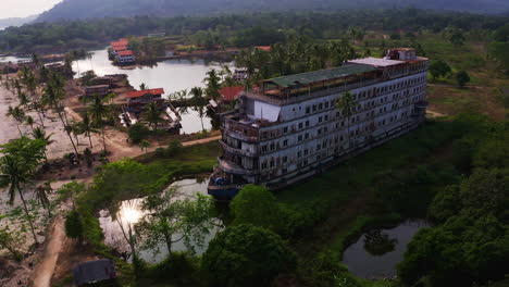 Rusting-cruise-ship-in-abandoned-ghost-resort-in-Koh-Chang,-Thailand