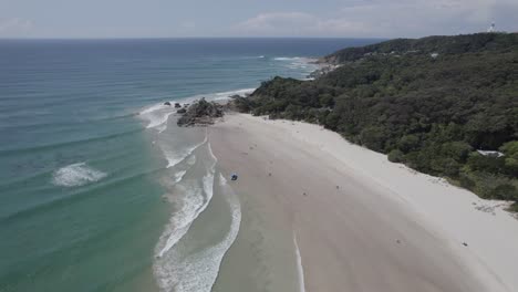 wide sandy clarkes beach in new south wales, australia - aerial drone shot