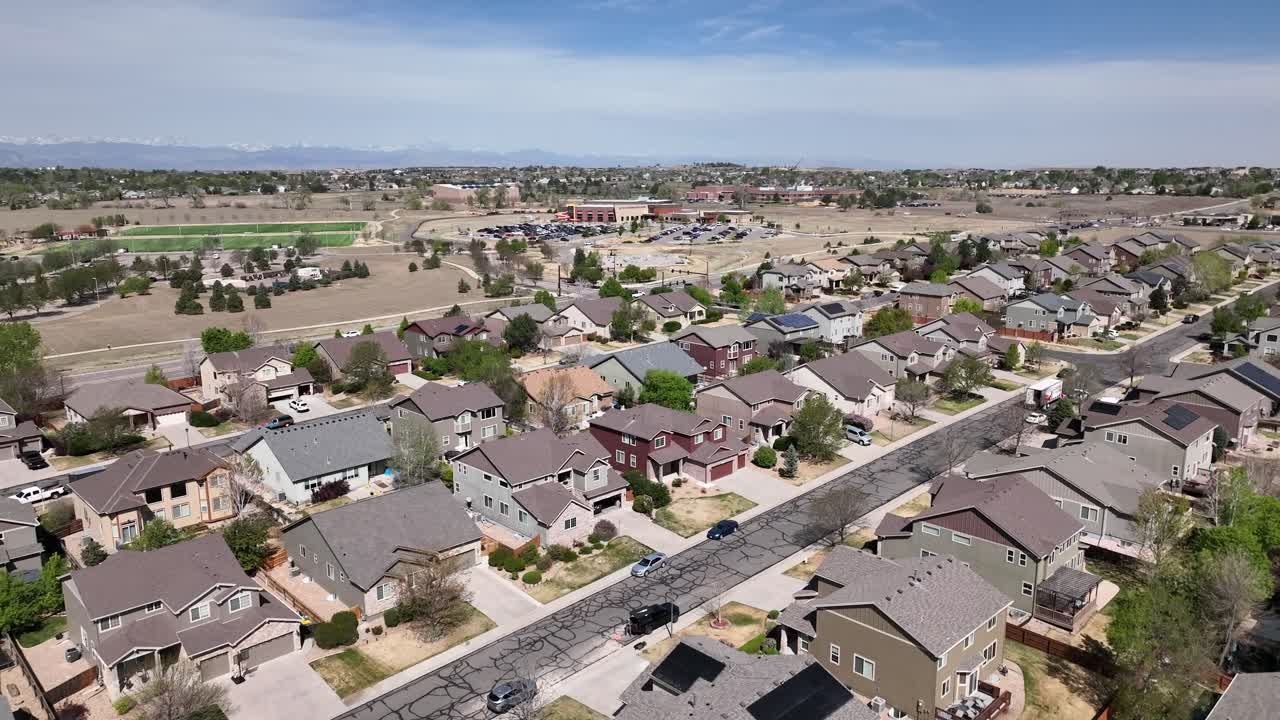 Thornton Colorado in the rocky mountain foothills community flyover featuring the Trail Winds Rec Center and neighborhood homes