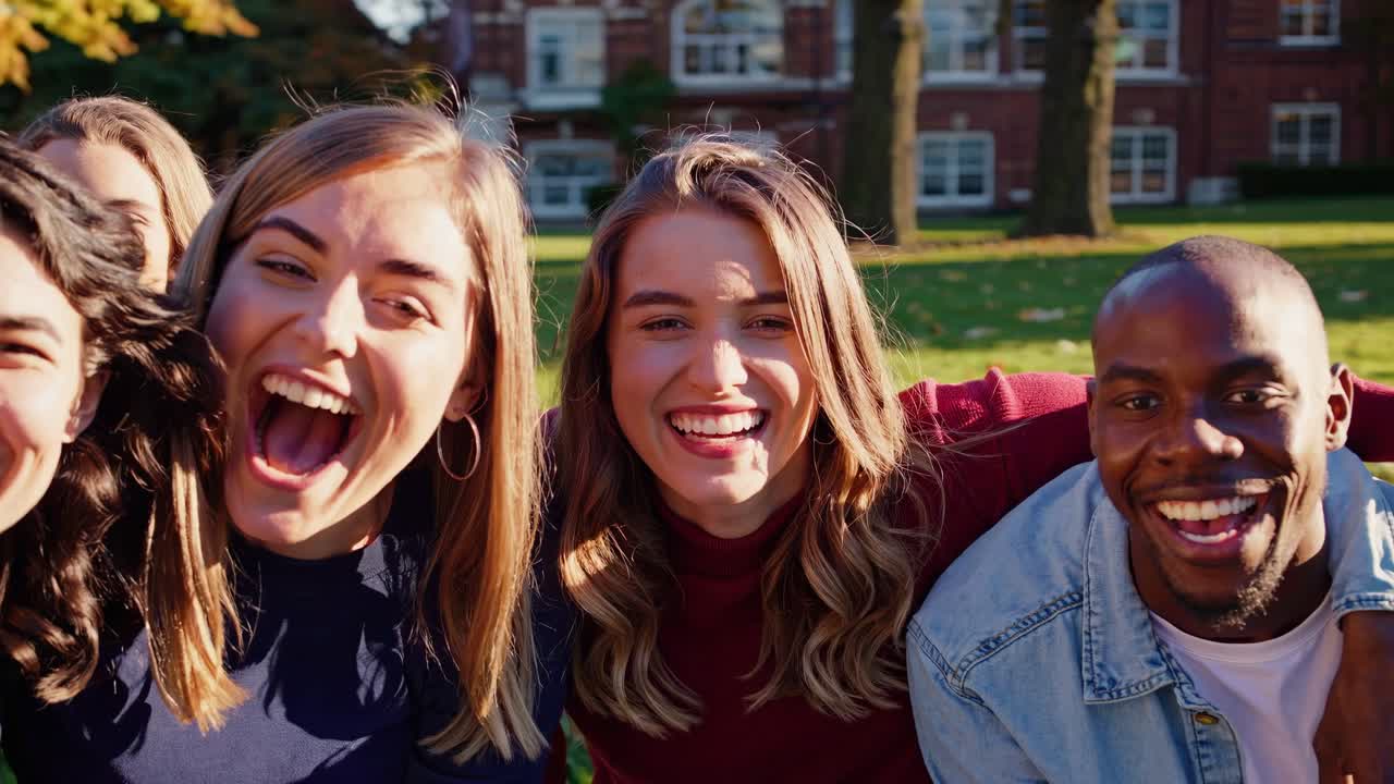 Happy Students Taking a Group Selfie on Campus