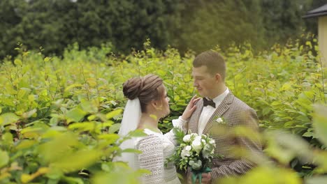 Newlyweds.-Caucasian-groom-with-bride-walking-in-park.-Wedding-couple.-Man-and-woman-in-love