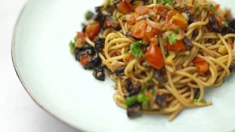 spaghetti puttanesca on a plate