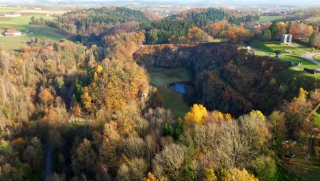 Aerial-View-Of-Wiener-Graben-Quarry-Site-At-Mauthausen-Concentration-Camp-During-Autumn-In-Upper-Austria