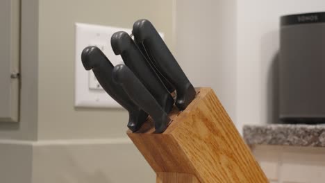 removal of a 'bird's beak' knife from a block.