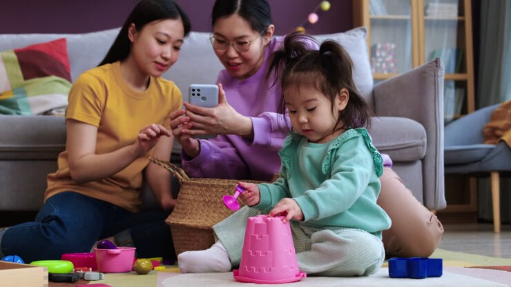 Asian mothers using smartphone