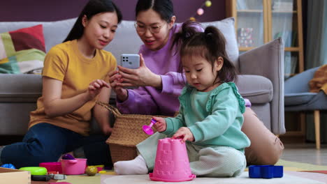 asian mothers using smartphone