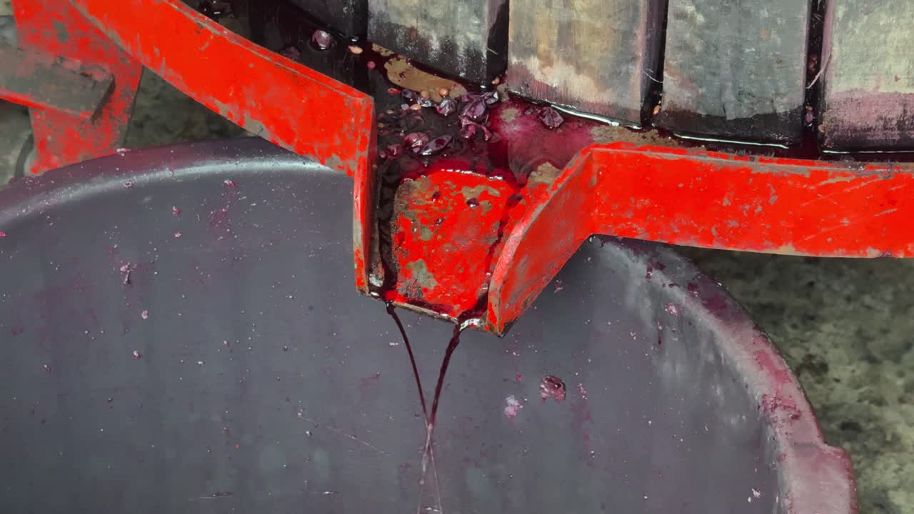 The wine press remains under pressure until all the juice has leaked from the grapes