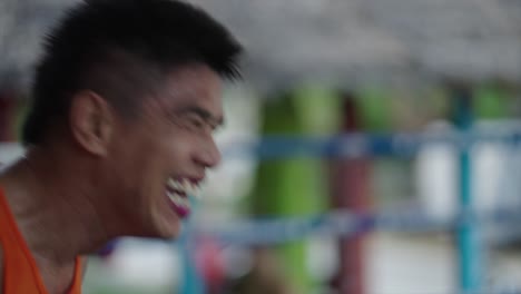 close-up of a male athlete's intense expression during training