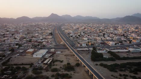 Speed-train-track-crossing-a-long-small-town-outside-Jeddah-city-all-the-way-to-Mecca-city