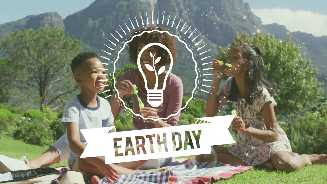 Earth Day animation over family blowing bubbles in park