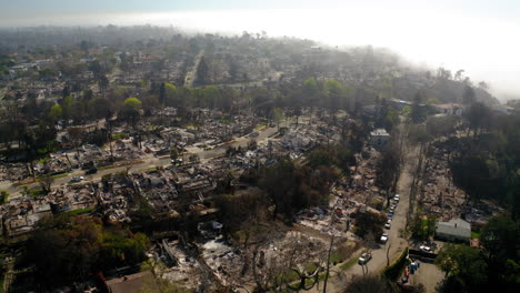 aerial view of a residential neighborhood devastated by wildfire