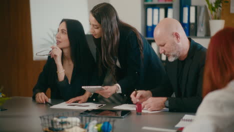 multiracial colleagues planning strategy in office.