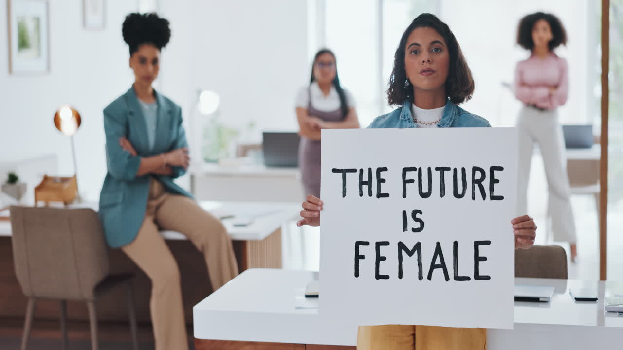 Equality, empowerment and female leader holding