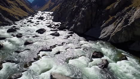 scenic river rapids in a rocky canyon