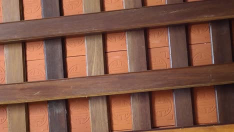 static display of a wooden roof's geometric design.