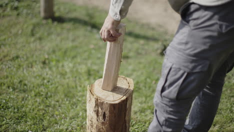 man chopping wood