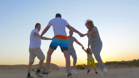 big family circle dancing