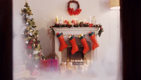 view of christmas tree and decoration from window