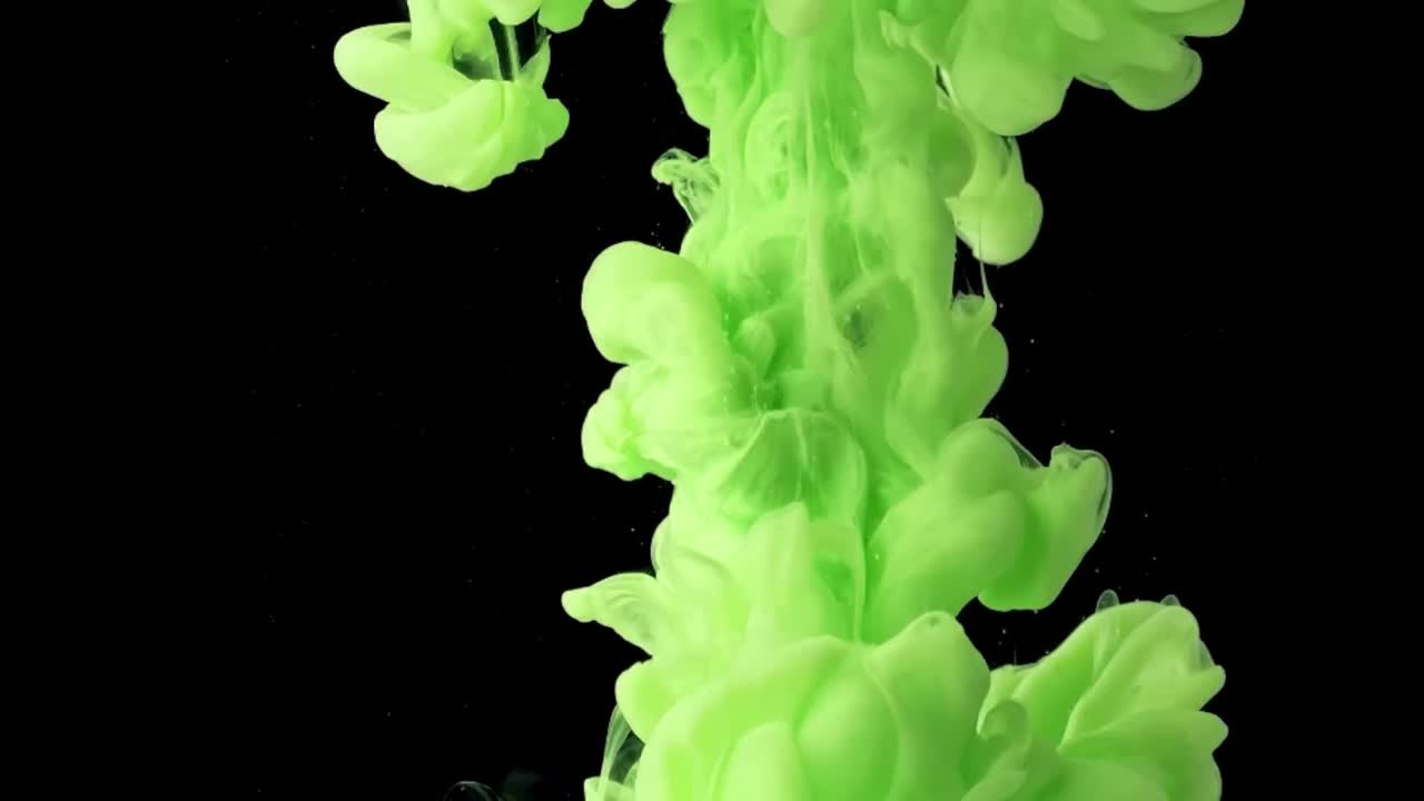 Premium stock video - Abstract mixing of radium green ink in water